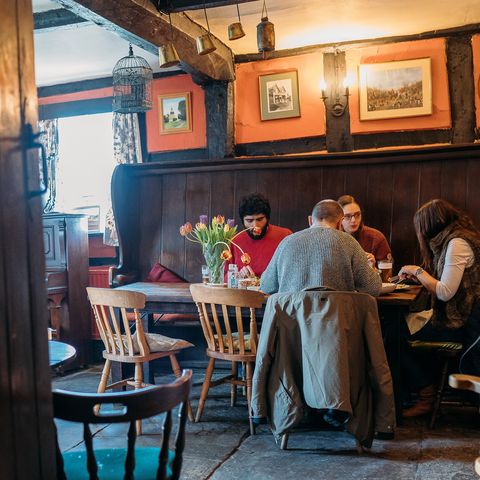 Family eting at a table in an old pub
