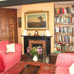 Kick off your shoes in our cosy lounge after a day exploring the orchards
