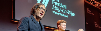 presenters on stage at the hay festival winter weekender