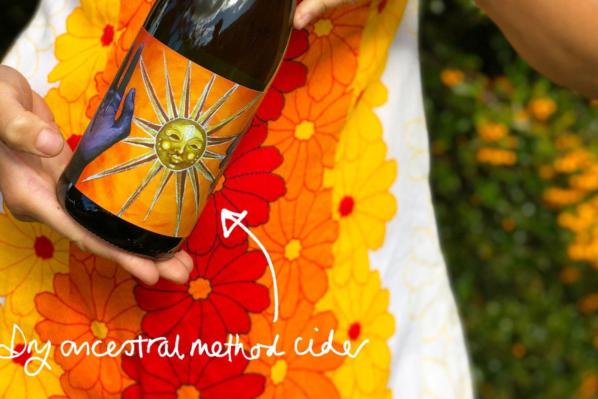 A bottle of Artistraw Cider