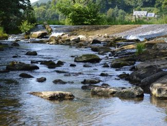 The river running by Riverside Inn, Aymestrey
