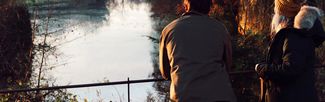 Couple looking over River Wye
