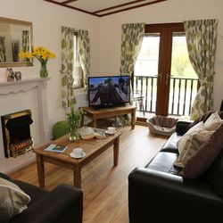 Spacious living areas with access to balcony
