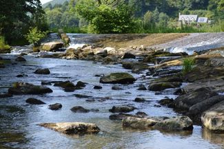 The river running by Riverside Inn, Aymestrey