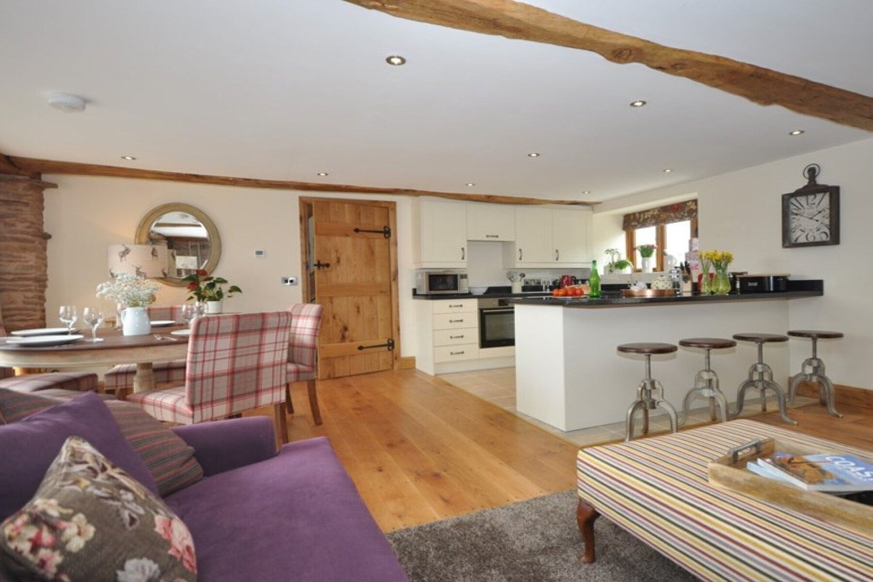 Open plan kitchen, dining and living area in Sunburst Barn