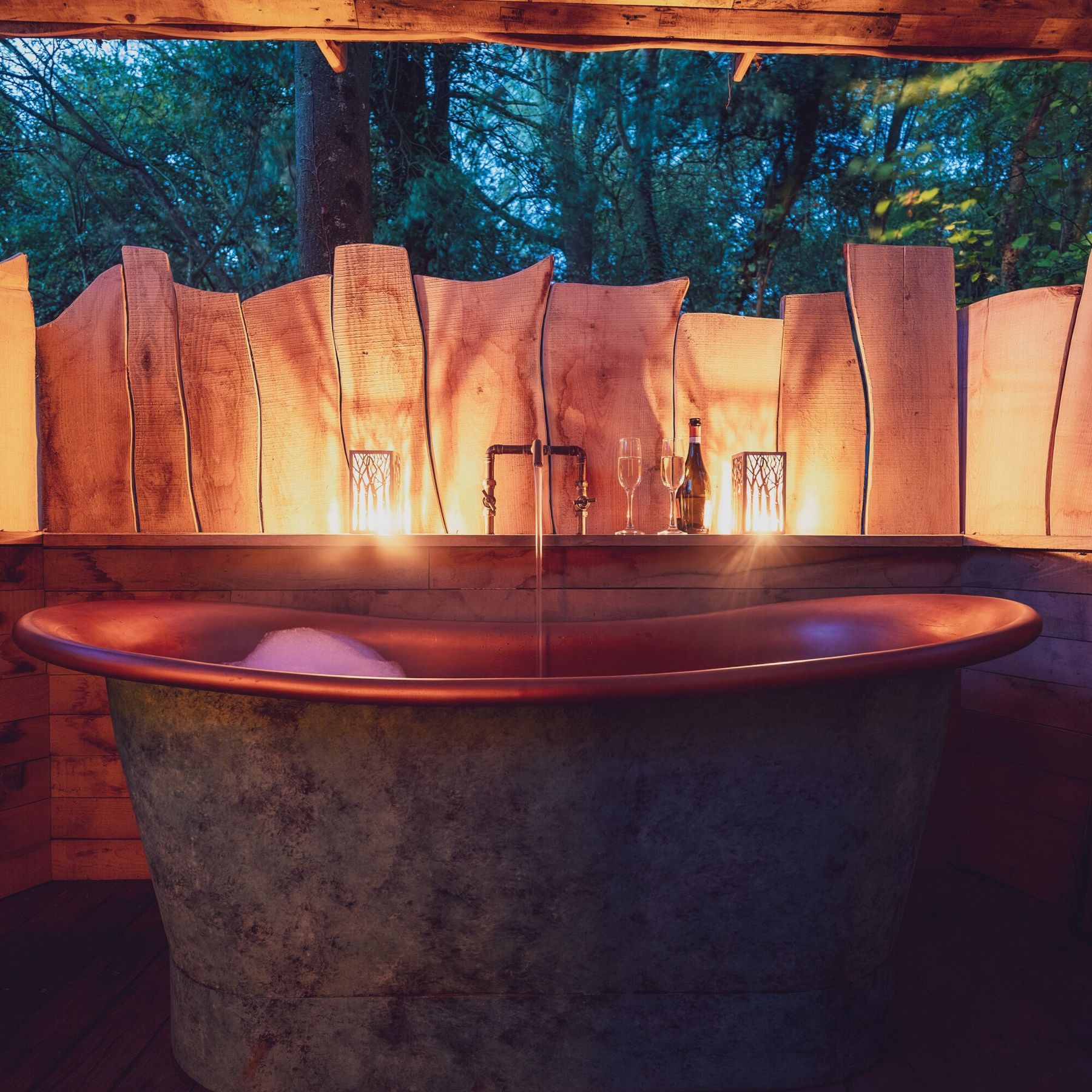 Indulge in a moonlit copper bath tub