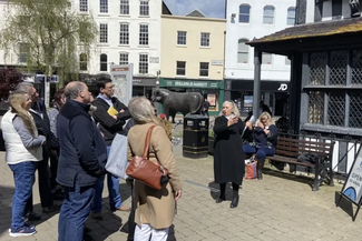 crowd on a guided tour through Hereford