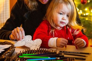 mother and child crafting at christmas
