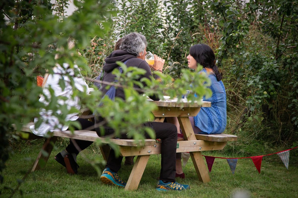 Sit amongst the trees with a glass of something delicious