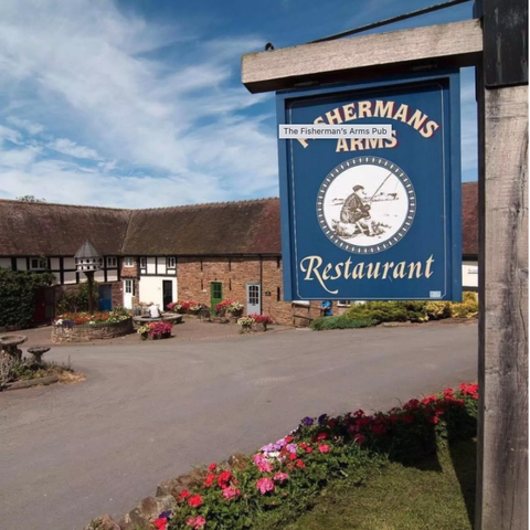Fishermans Arms sign with pub in the background