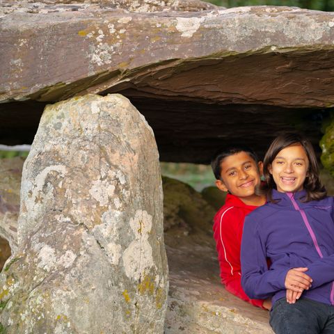 Children playing underneath Arthur's Stone