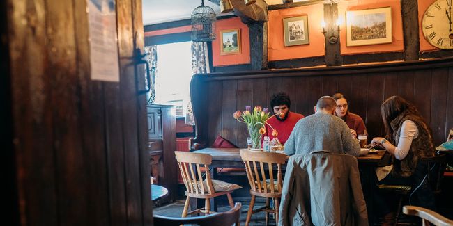 Family eting at a table in an old pub