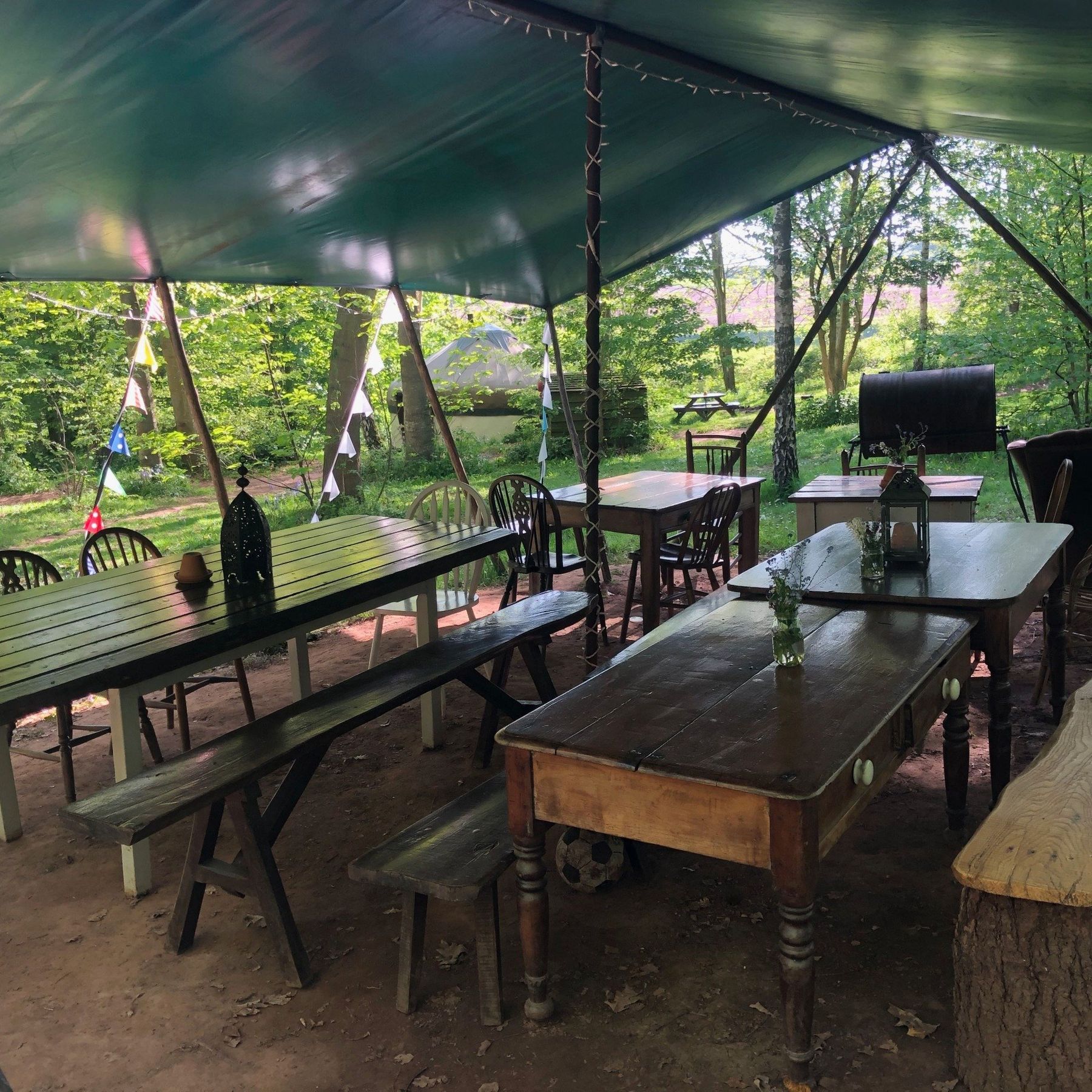 Communal eating area under the woodsmans awning