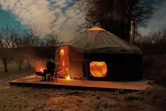 Yurt exterior at night