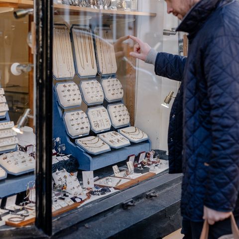Man looking into jewelry shop