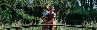 woman and child in garden
