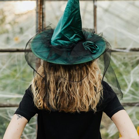 Girl in witches hat