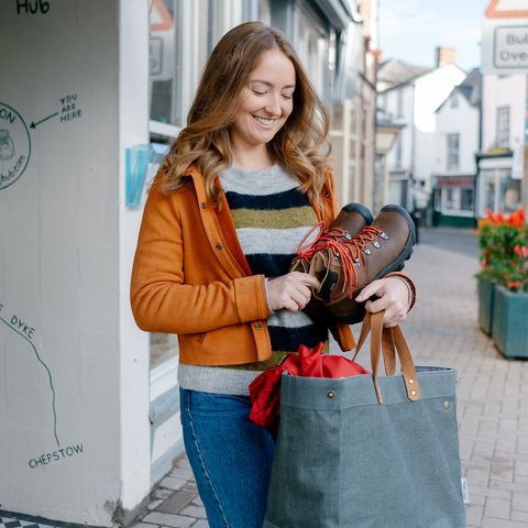 shopping carrying large bag of goods
