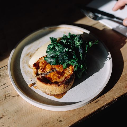 Plate of vegetable tart and greens