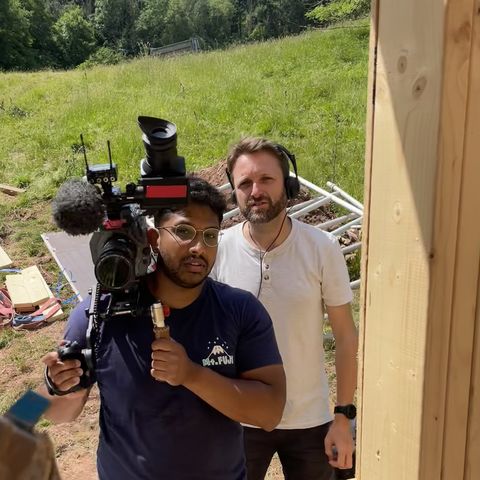 camera crew filming at scandi cabin