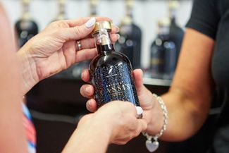 Holding British Cassis