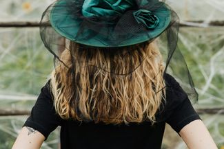 Girl in witches hat