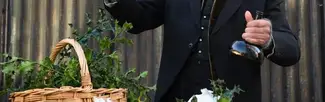 Victorian style dressed man with hamper