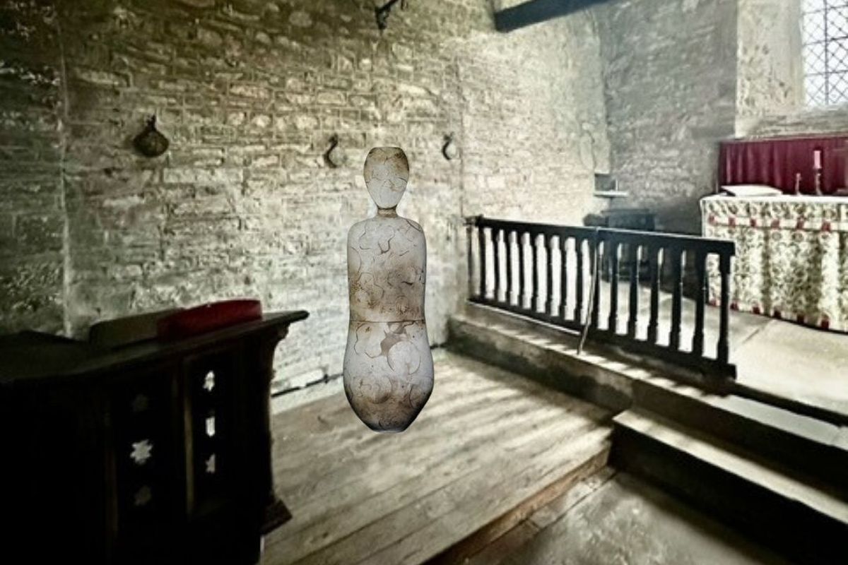 monochrome photo of glass vessel in room with exposed beams