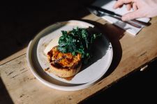 Plate of vegetable tart and greens