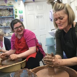 potter's wheel course participants at Eastnor Pottery