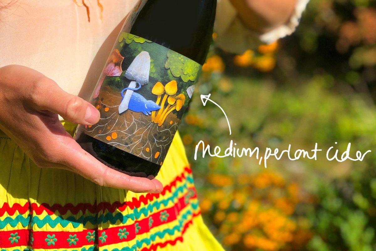 A bottle of Artistraw Cider