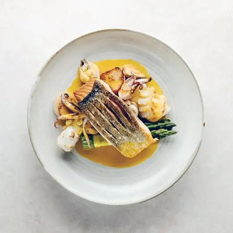 Plate of seared fish and asparagus