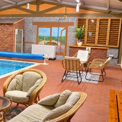 30ft Indoor Heated Pool | Dry Sauna | Outdoor Hot Tub