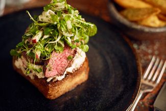 Cut of beef with greenery