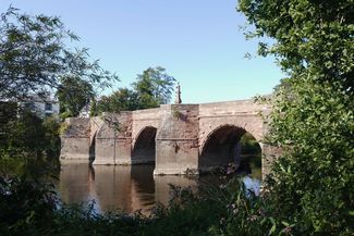 Sunny view of Wilton Bridge over river provided by Ross Photographic Society
