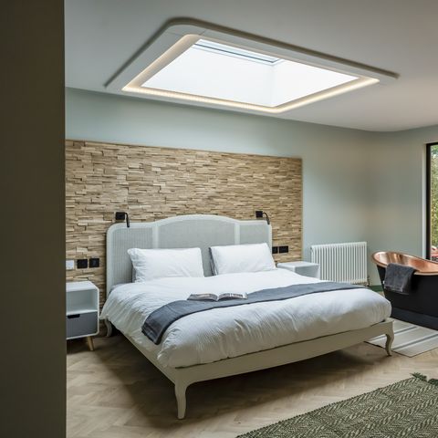 bedroom with copper bath