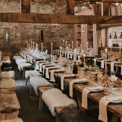 rustic barn wedding set up with long tables