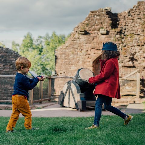 Children playing in a castle