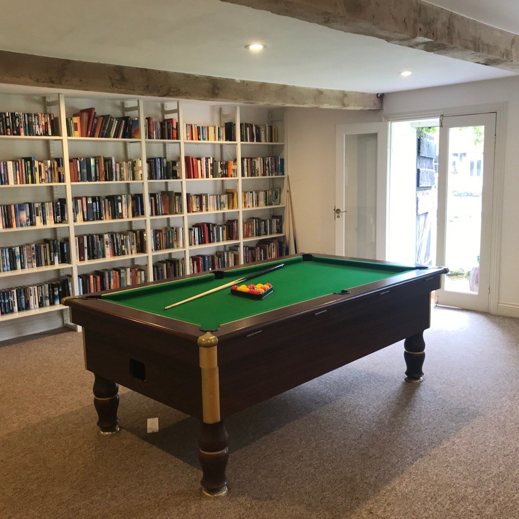 The games room with pool table and table football