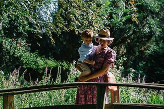 woman and child in garden