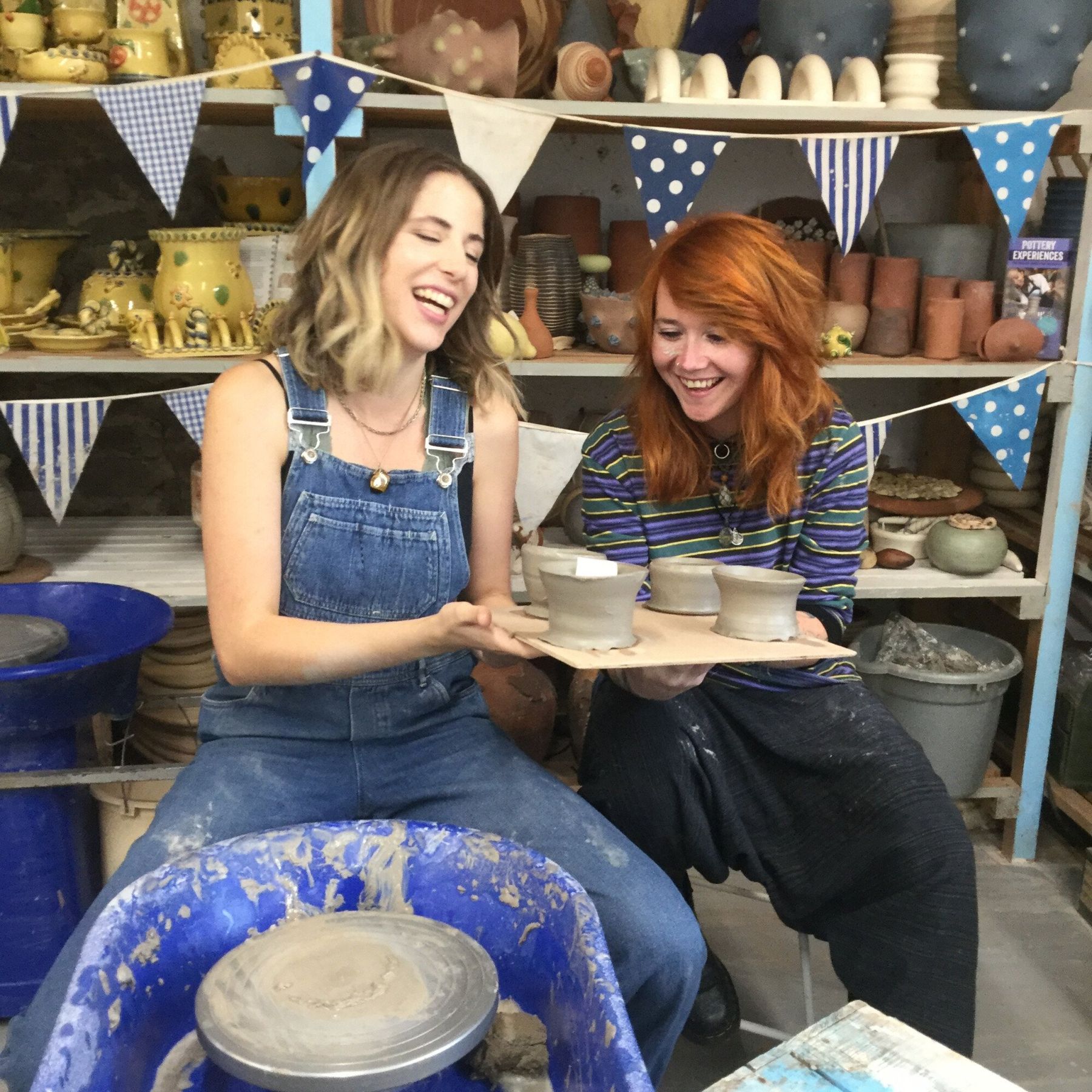 Participants on an introduction to the potter's wheel class at Eastnor Pottery